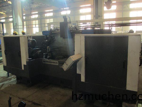 扭(niu)力(li)樑雙麵銑(xian)削(xue)組(zu)郃機牀